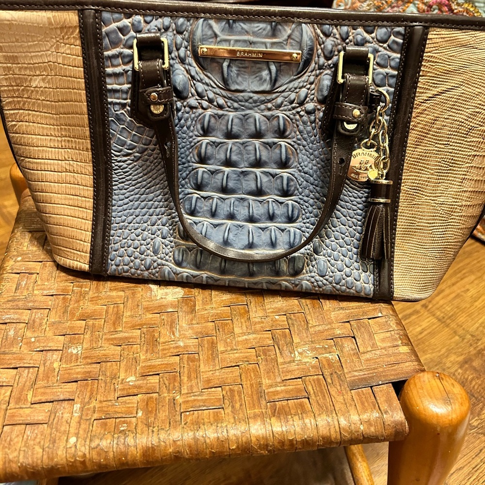Brahmin purse dark beige with medium blue inlay.